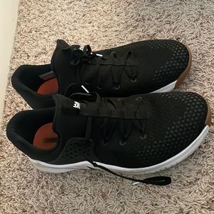 Black Nike training shoes